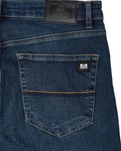 444 Tapered Dark Vintage Denim Jeans